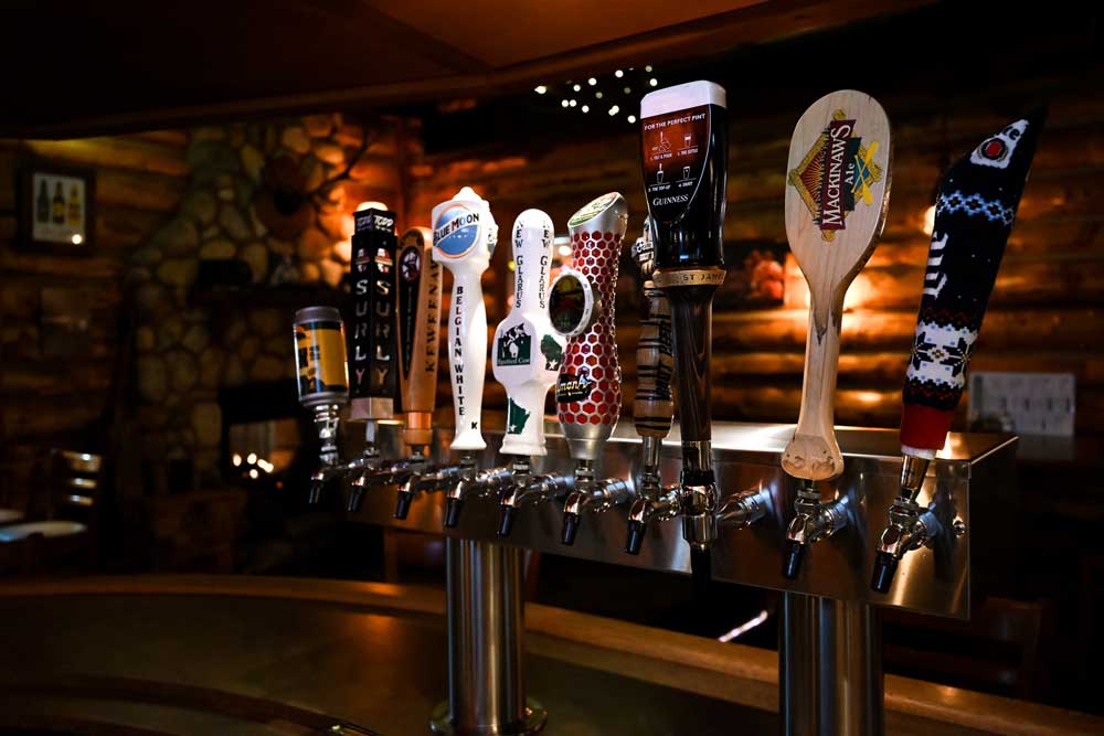 Beer taps at the cabin bar at Mackinaw Grill & Spirits in Green Bay WI.